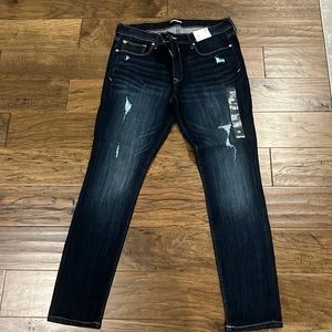 Express womens jeans NWT 12 regular mid rise legging.